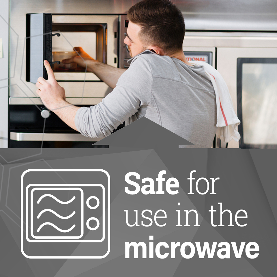 man reaching into a microwave